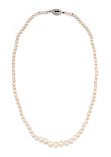 * A Vintage Graduated Single Strand Cultured Pearl Necklace, French,