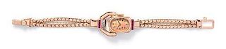 A Retro 14 Karat Rose Gold, Ruby and Diamond Wristwatch, Paul Ditisheim, 15.20 dwts.