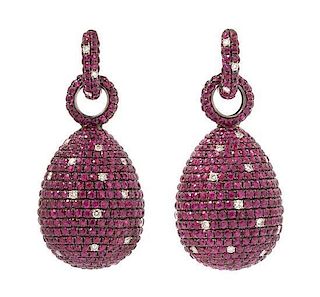 A Pair of Gold, Ruby and Diamond Drop Earrings, 19.40 dwts.