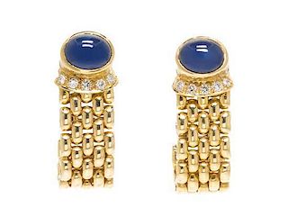 A Pair of 18 Karat Yellow Gold, Diamond and Sapphire Earclips, 16.15 dwts.