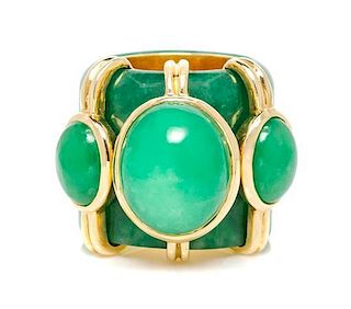 An 18 Karat Yellow Gold and Jade Archer's Ring, Tony Duquette, 50.20 dwts.