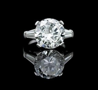 * A Platinum and Round Brilliant Cut Diamond Ring, 6.20 dwts.