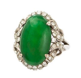 * An 18 Karat White Gold, Jade and Diamond Ring, Circa 1950, 5.10 dwts.