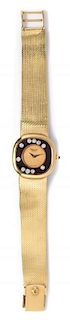 * An 18 Karat Yellow Gold and Diamond Happy Diamonds Wristwatch, Chopard, 35.00 dwts.