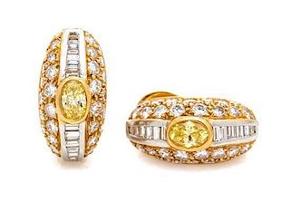 A Pair of 18 Karat Yellow Gold, Platinum, Colored Diamond and Diamond Earclips, 5.60 dwts.
