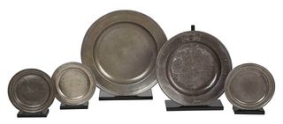 Five British Pewter Chargers and Plates