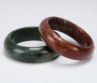 TWO WIDE HARDSTONE BANGLES 