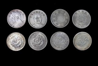 EIGHT CHINESE COINS IN SLEEVE