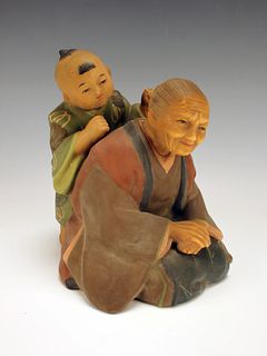 JAPANESE STATUE OF WOMAN AND CHILD