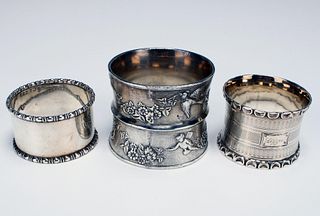 LOT OF THREE SILVER NAPKIN RINGS, TWO PLATE AND ONE STERLING