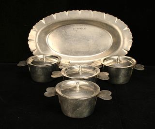 FOUR FRENCH TIN CHARLOTTE MOLDS WITH LIDS
