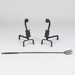 Pair of Cast Iron Andirons and a Large Fire Tool