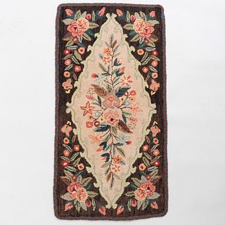 Group of Four Floral Hooked Rugs