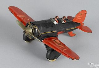 Hubley cast iron Lindy NR-211 Lockheed Sirius airplane with a pilot, a co-pilot, rubber wheels