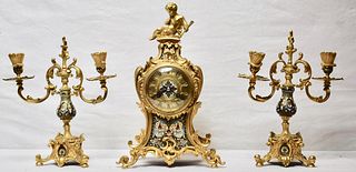 Set of bronze Candelabras with ornate clock
