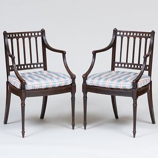 Pair of George III Carved Mahogany and Caned Armchairs 