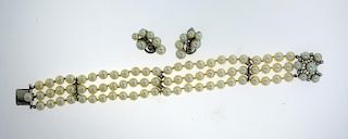 14k white gold pearl and diamond three strand pearl bracelet with matching earrings