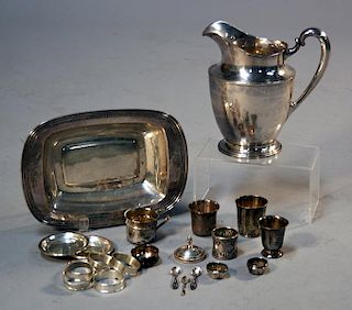 Sterling water pitcher, with two sterling bowls, napkin rings and assorted sterling