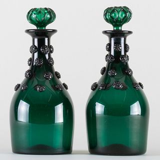 Pair of Emerald Glass Decanters and Stoppers Decorated with Raspberry Prunts
