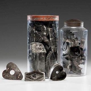 Tin Cookie Cutters in Storage Jars