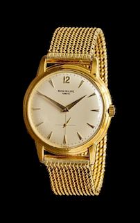 * An 18 Karat Yellow Gold Ref. 2551 Wristwatch, Patek Phillipe,
