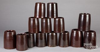 Fourteen stoneware canning jars, 19th c.
