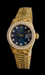 An 18 Karat Yellow Gold and Diamond Ref. 69138 Oyster Perpetual Datejust Wristwatch, Rolex, Circa 1988,