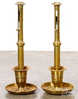 Pair of large brass push-up candlesticks, 19th c.