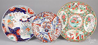 Three Chinese and Japanese porcelain chargers