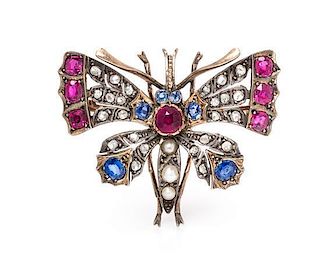 A Victorian Silver Topped Gold, Diamond, and Multigem Butterfly Brooch, 10.40 dwts.