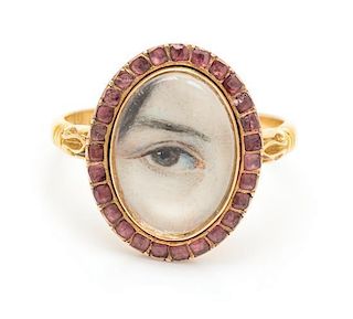 A Georgian Gold and Garnet Lover's Eye Ring, 2.70 dwts.