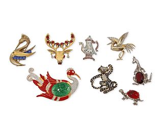 A group of animal-themed costume jewelry