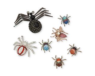 A group of insect themed jewelry