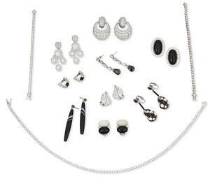 A large group of black and white statement jewelry