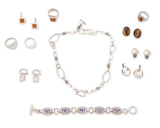 A group of silver and simulated gemstone jewelry