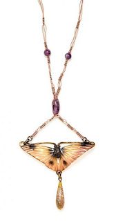 * An Art Nouveau Dyed Horn and Amethyst Pendant, Georges Pierre,