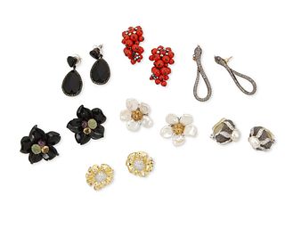 A group of statement earrings