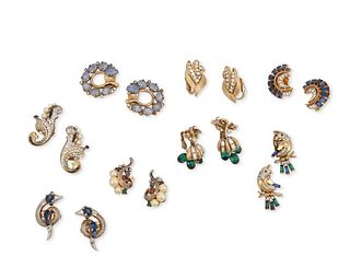 A large group of Trifari earrings