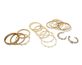A large group of gold-toned jewelry