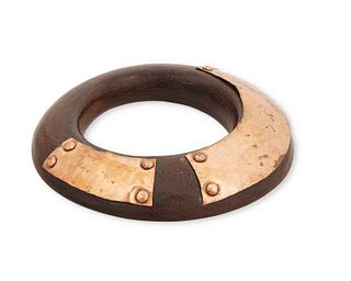 A vintage copper and wood bangle bracelet