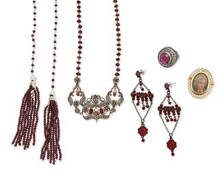 A group of red stone jewelry items