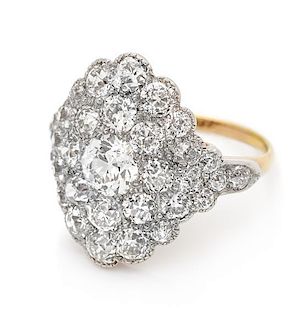 An Edwardian Platinum Topped Gold and Diamond Ring, 4.50 dwts.