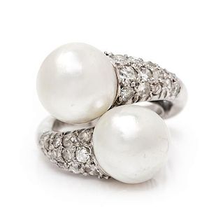 A Platinum, Pearl and Diamond Bypass Ring, 6.10 dwts.