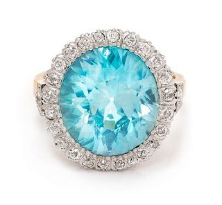 An Edwardian Platinum Topped Gold, Blue Zircon and Diamond Ring, 6.70 dwts.