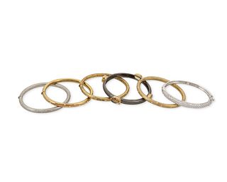 A group of sterling and vermeil bracelets