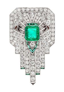 An Art Deco Platinum, Emerald, Diamond, and Multigem Clip Brooch, 8.90 dwts.