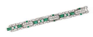 An Art Deco Platinum, Diamond and Emerald Bracelet, 31.90 dwts.