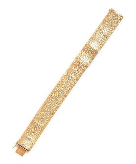 * An 18 Karat Tricolor Gold Bracelet, 32.60 dwts.