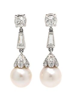 A Pair of Platinum, Diamond and Cultured Pearl Pendant Earrings, 6.10 dwts.