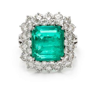 * A Platinum, Emerald and Diamond Ring, 7.90 dwts.
